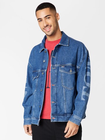 Tommy Jeans Φθινοπωρινό και ανοιξιάτικο μπουφάν σε μπλε: μπροστά