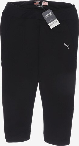 PUMA Shorts in M in Black: front