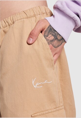 Wide leg Pantaloni cargo di Karl Kani in beige