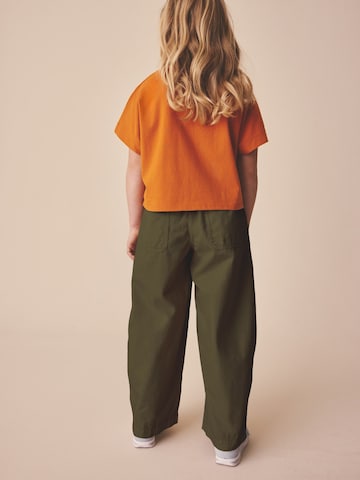 T-Shirt Next en orange