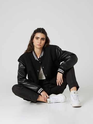 About You x Nils Kuesel Between-season jacket 'Can' in Black