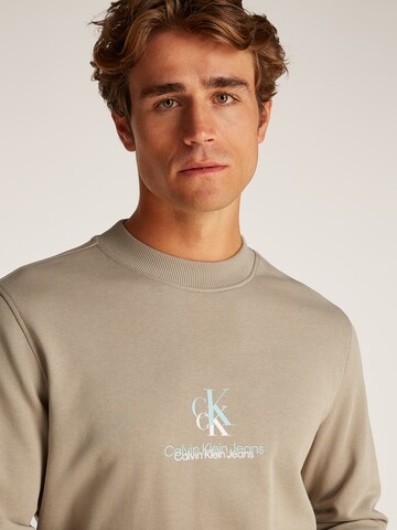 Calvin Klein Jeans Свитшот в Бежевый