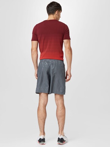 UNDER ARMOUR Regular Sportshorts 'Emboss' in Grau