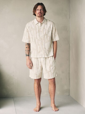 Pyjama court Next en beige : devant