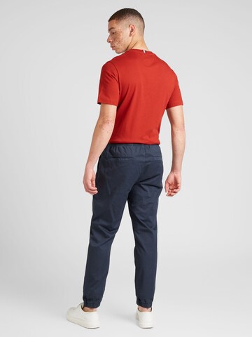 Tapered Pantaloni 'AUSTIN' de la Tommy Jeans pe albastru