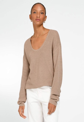 Pull-over include en beige : devant