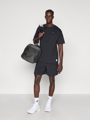 T-Shirt fonctionnel NIKE en noir