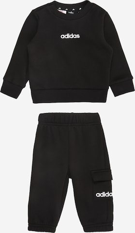 juoda ADIDAS SPORTSWEAR Treniruočių kostiumas: priekis