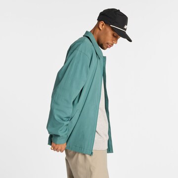 new balance Tussenjas 'Numeric Coaches' in Groen