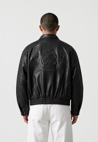 Veste mi-saison Vertere Berlin en noir : derrière