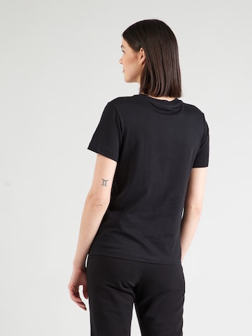 Maglietta di Champion Authentic Athletic Apparel in nero