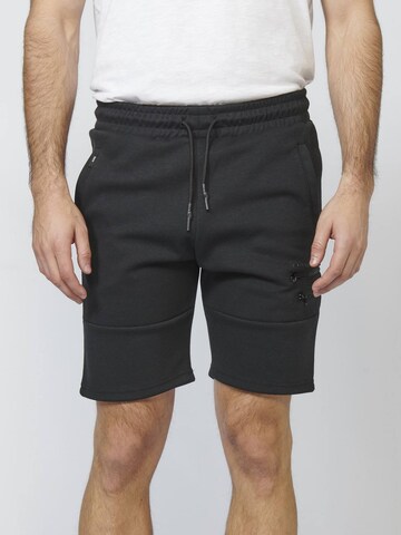 Slimfit Pantaloni di KOROSHI in nero