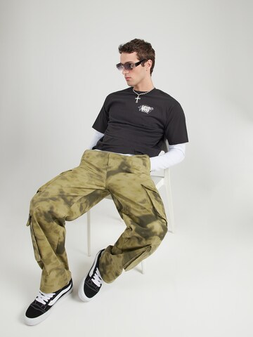 VANS T-Shirt 'Awaken Tiger' in Schwarz