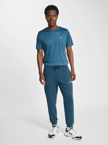 Hummel Tapered Sportbroek 'Tech Fleece' in Blauw