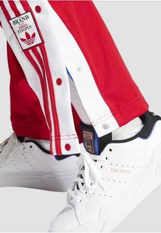 sarkans ADIDAS ORIGINALS Vaļīgs piegriezums Bikses 'Adibreak'