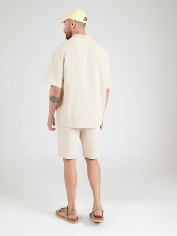 SELECTED Comfort Fit Φόρμα τρεξίματος 'SLHRLXCAL' σε μπεζ
