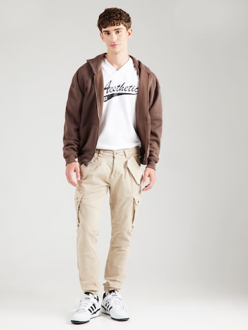 Tapered Pantaloni cu buzunare 'Combat' de la ALPHA INDUSTRIES pe bej