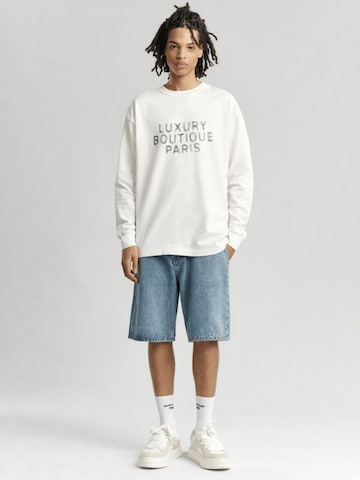 Mansour Sweatshirt 'Luxury Boutique Longsleeve' in Weiß