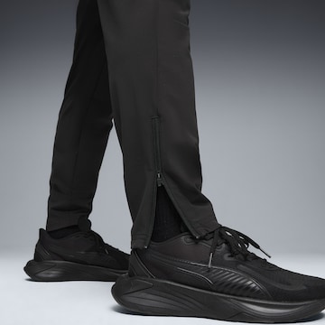 Effilé Pantalon de sport PUMA en noir