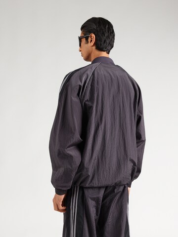 ADIDAS ORIGINALS Átmeneti dzseki 'Adilenium' - fekete