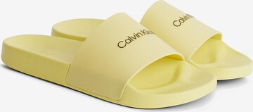 Calvin Klein Pantoletter i gul