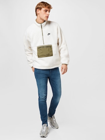 Nike Sportswear Prehodna jakna | bela barva