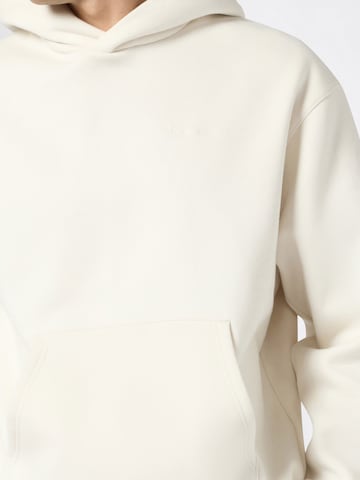Champion Authentic Athletic Apparel Sweatshirt i hvid