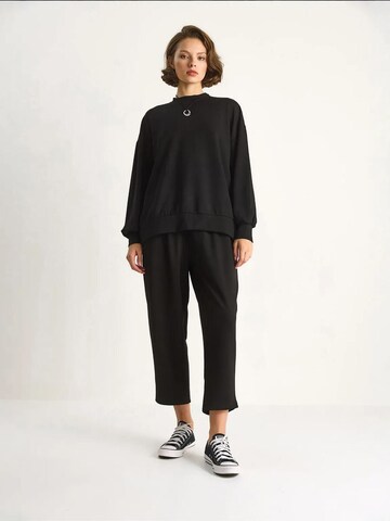 Tuta da jogging di Bianco Lucci in nero