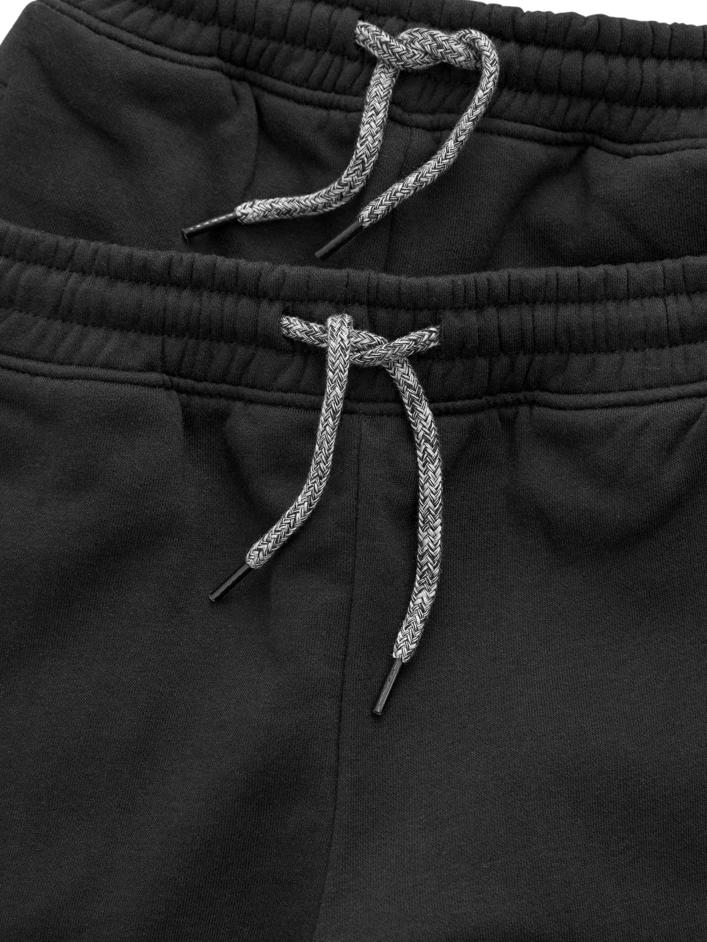 Next - Tapered Pantalón en negro