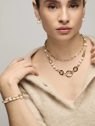 LUXBYLUX Earrings in White: front