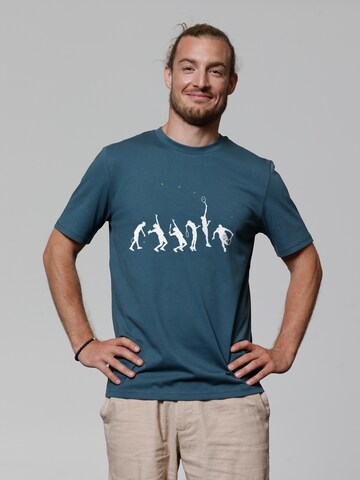 T-Shirt 'Tennis Evolution' Watapparel en bleu : devant
