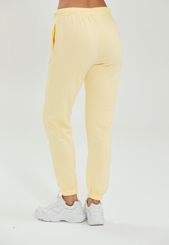 Athlecia Regular Workout Pants 'Soffina' in Yellow