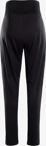 Effilé Pantalon de sport 'HP103' Winshape en noir