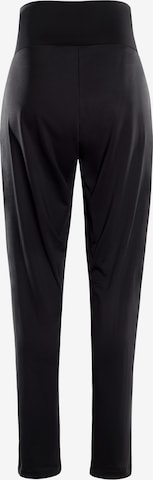 Effilé Pantalon de sport 'HP103' Winshape en noir