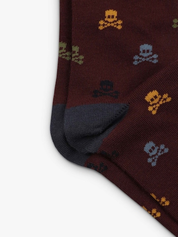 Chaussettes 'Skull' Scalpers en rouge