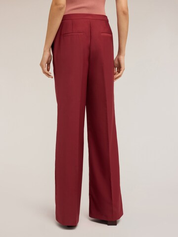 MOTIVI Regular Trousers in Red