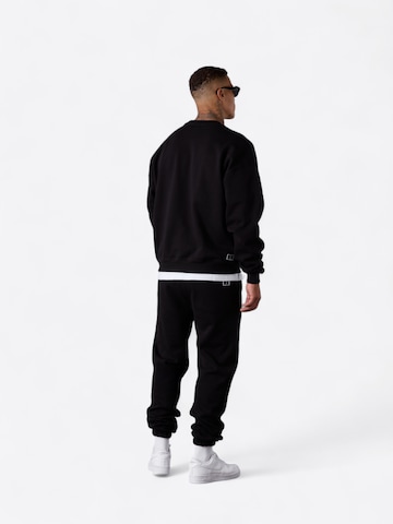 ESTEEM Tapered Trousers 'Sélection Privée' in Black