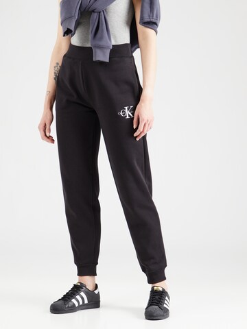 Tapered Pantaloni de la Calvin Klein Jeans pe negru: față
