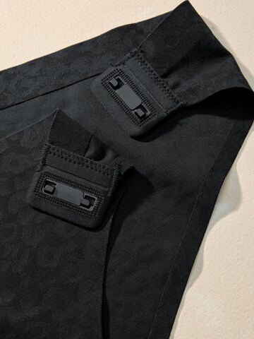 juoda Next Moteriškos kelnaitės