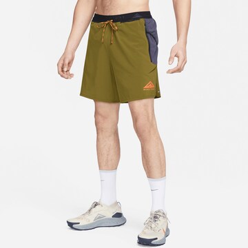 NIKE Regular Pants in Yellow: front