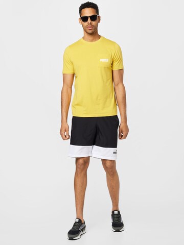 PUMA Sportshirt in Gelb