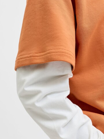 Jack & Jones Junior Sweatshirt 'JCOECHO' in Orange