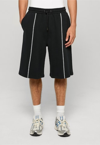 Urban Classics - Loosefit Pantalón en negro: frente