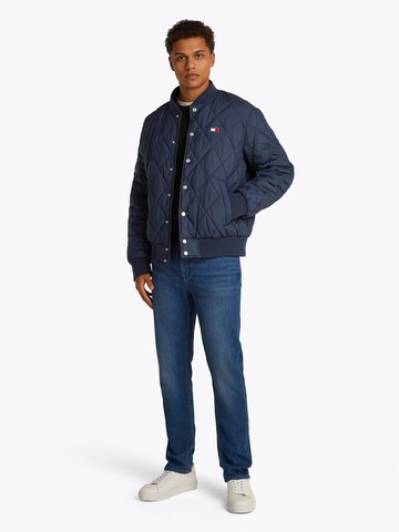 Tommy Jeans Prehodna jakna | modra barva