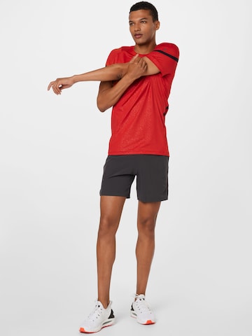 UNDER ARMOUR Regular Sportbroek 'SpeedPocket' in Grijs