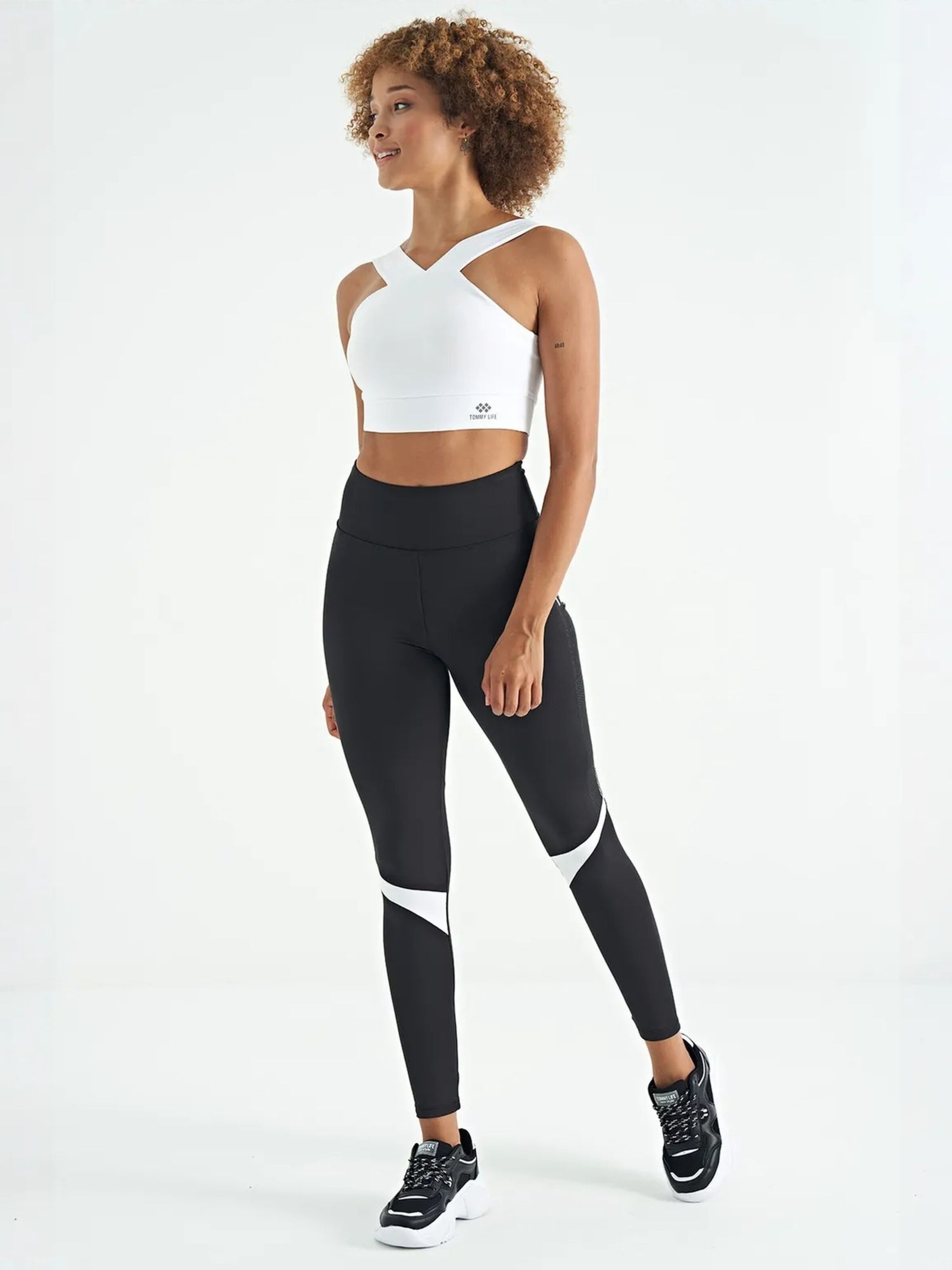 Top sportivo di Tommy Life in bianco