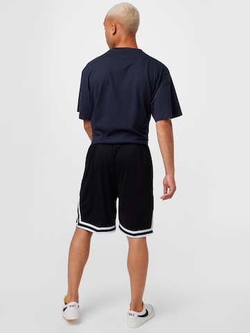 Karl Kani Loosefit Shorts in Schwarz