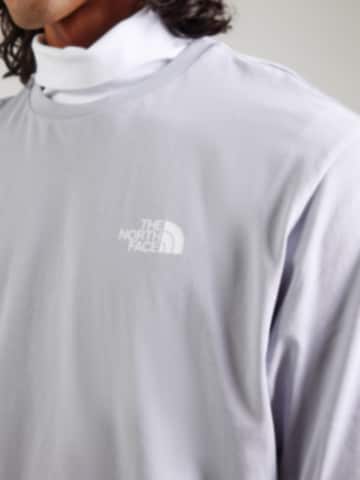 Tricou 'EXPLORE GEAR' de la THE NORTH FACE pe albastru