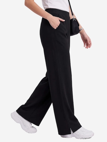 Wide leg Pantaloni 'Hose' di Tommy Life in nero