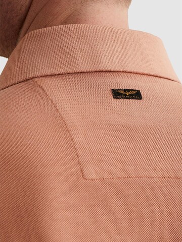T-Shirt 'Polo shirt with garment-dye wash and tailwing logo' PME Legend en rose